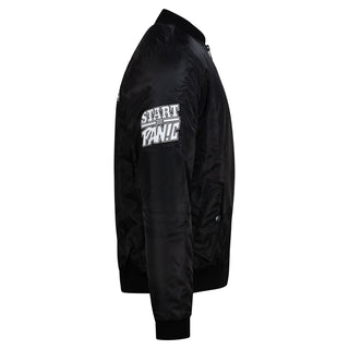A black nylon bomber jacket shown from a side profile view, featuring a white and black 'START PANIC' graphic printed on the upper left sleeve.